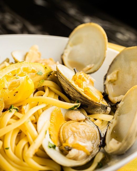 Nunzi’s by the Water signature dishes Stuffed Calamari, Tuscan Chicken Wings, Lobster & Shrimp Pappardelle.